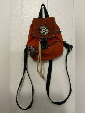 A Very Rare Nylon Vintage Burnt Orange Small Kipling Backpack Rucksack Bag